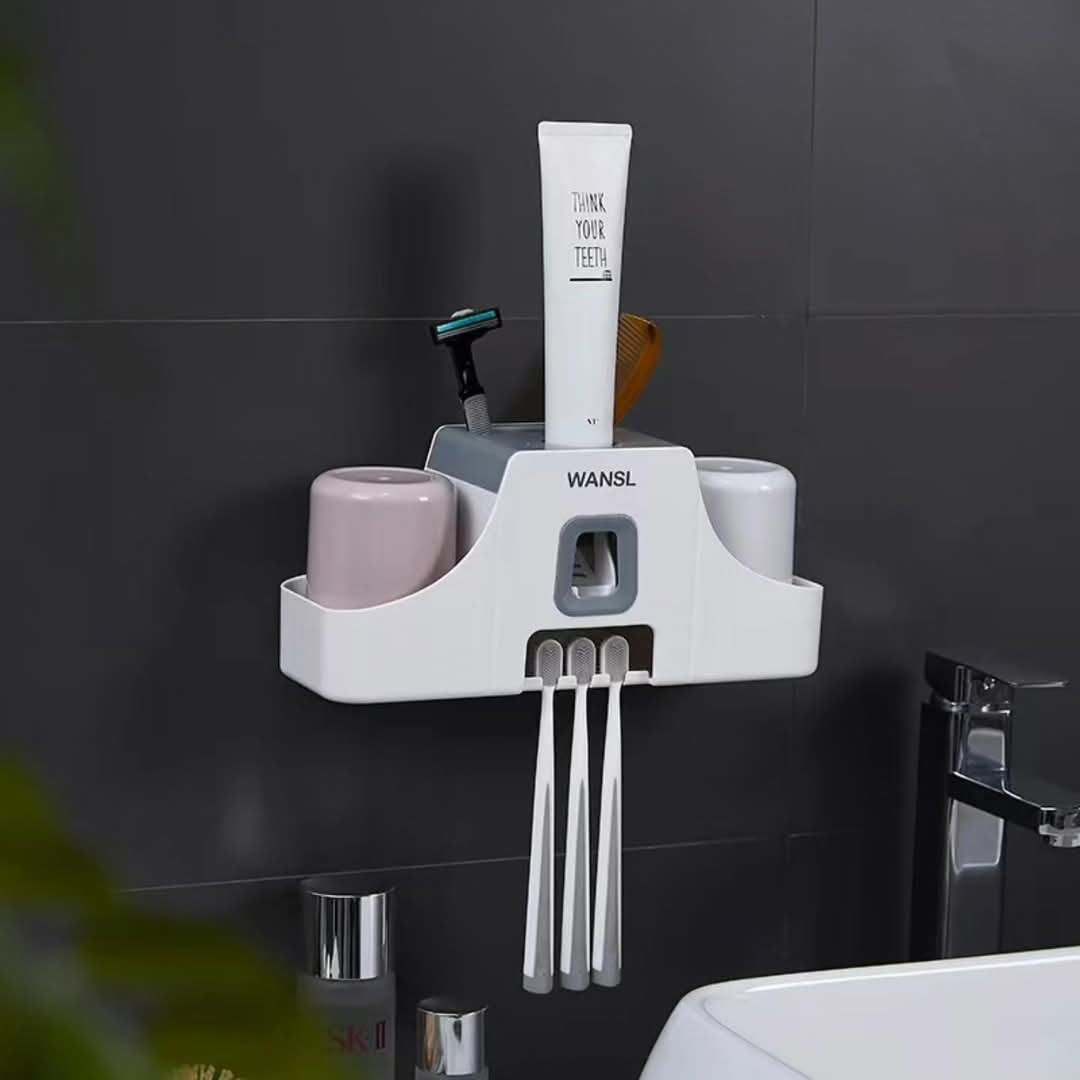 Toothbrush holder and paste dispenser