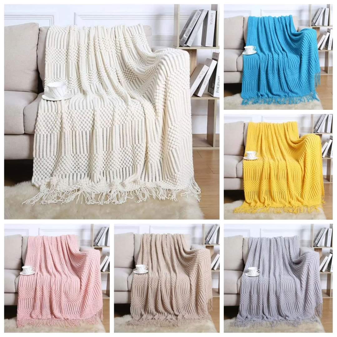 Knitted throw blankets with tassel