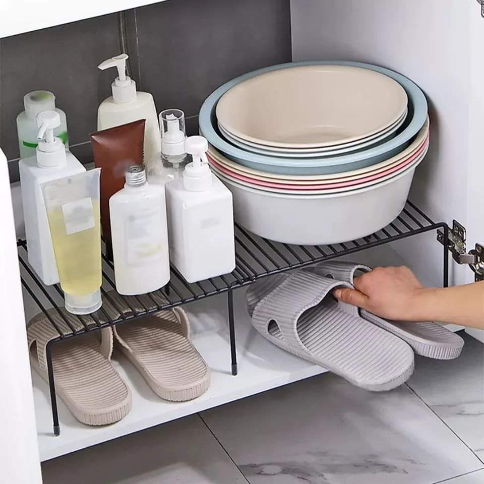 Expandable shelf raiser