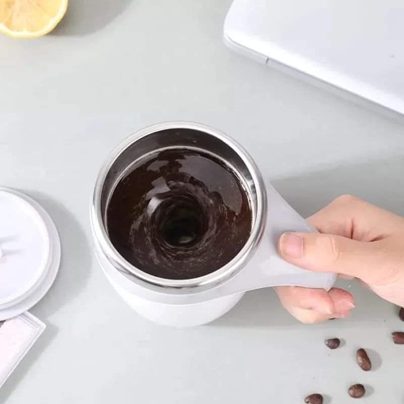 Self stirring cup